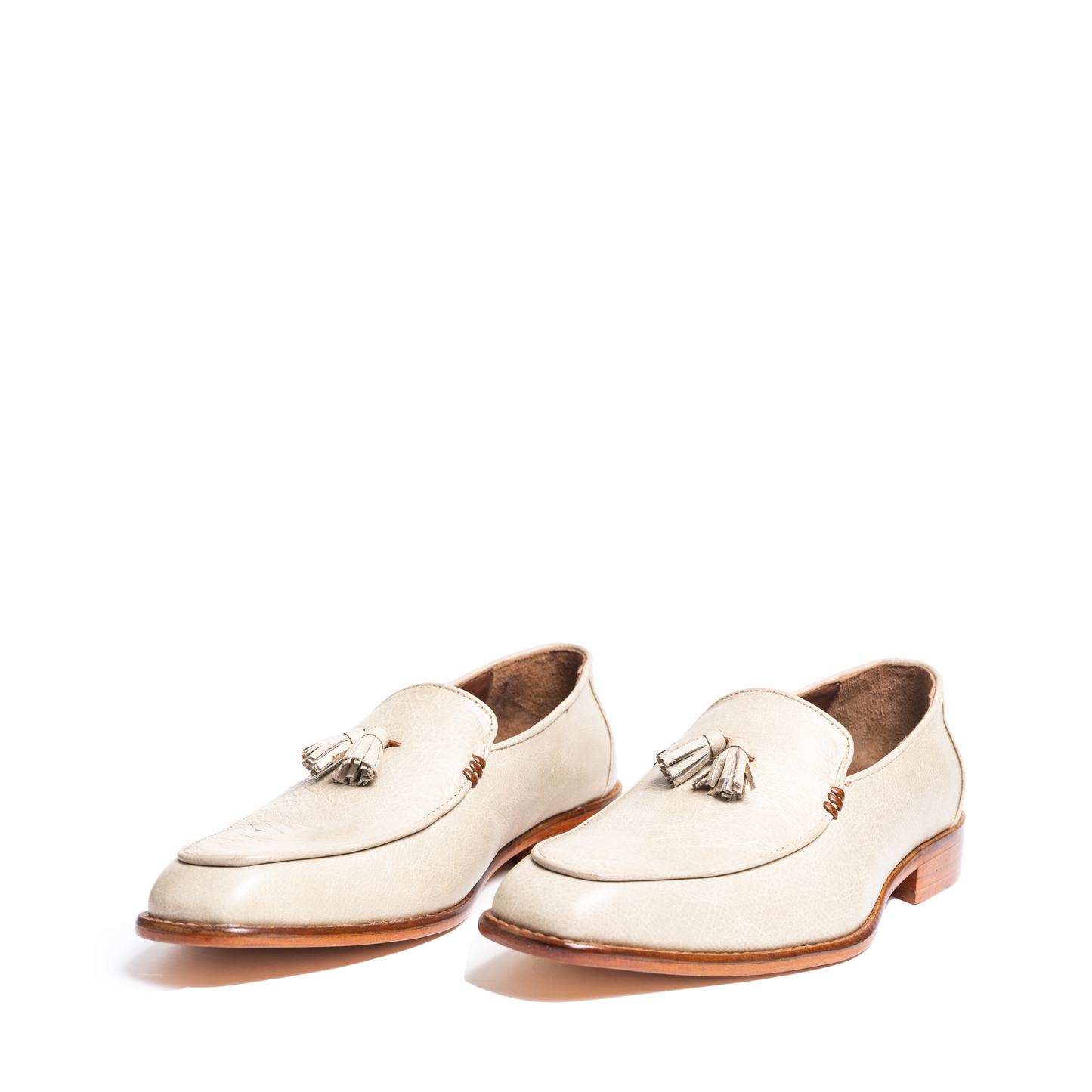 CREAM TASSEL JUTTIS