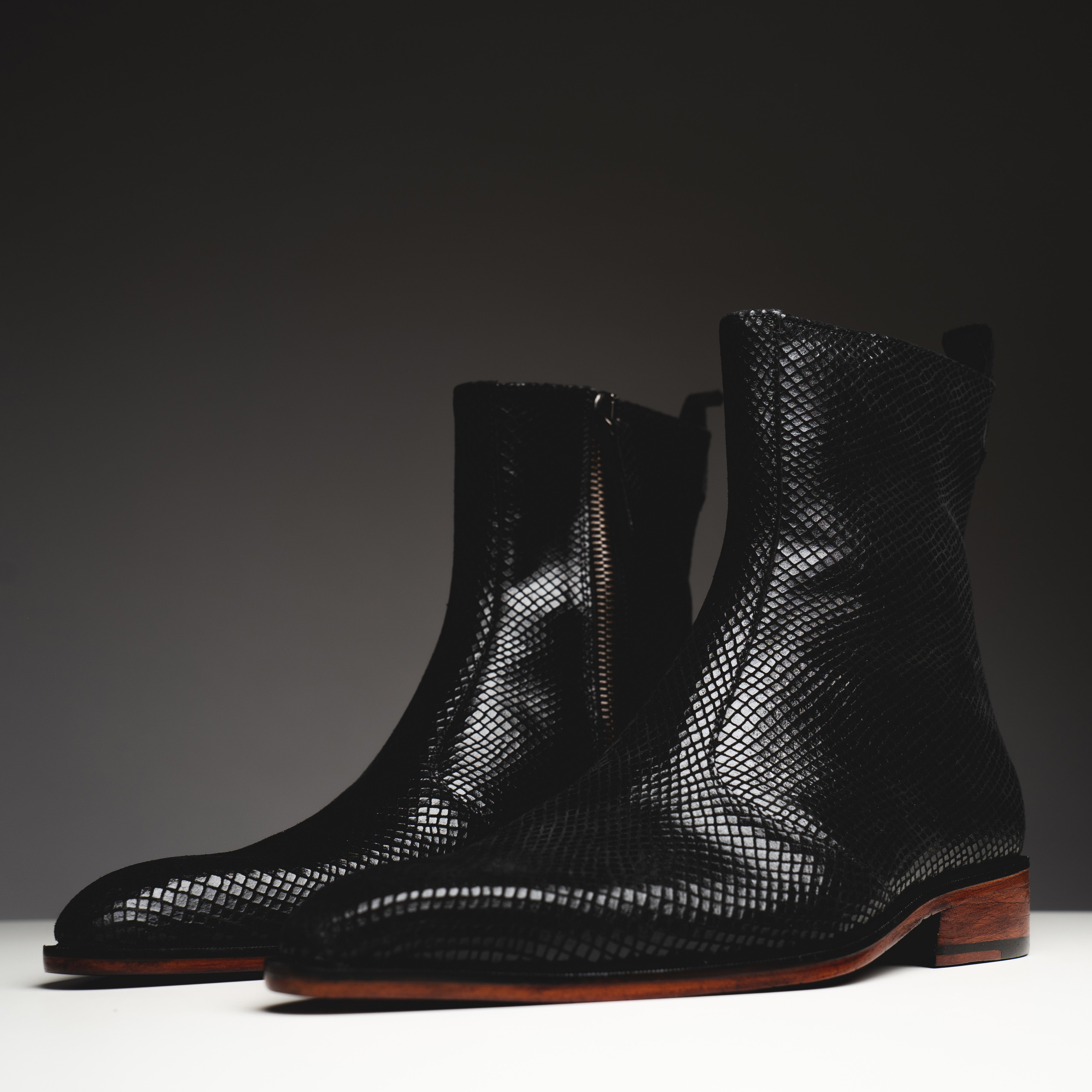 Black printed python boots – Kavith Sainaani Store