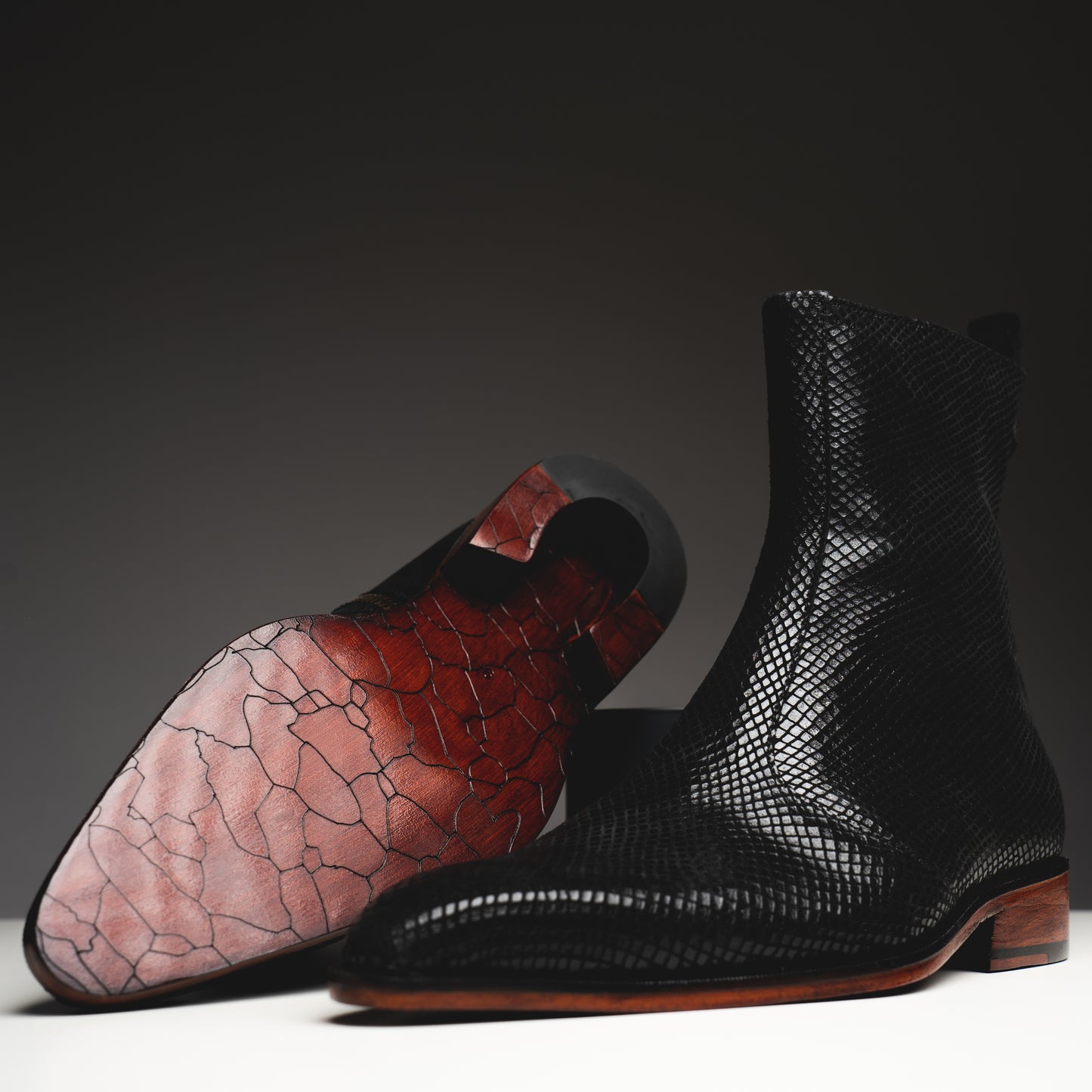 Black printed python boots