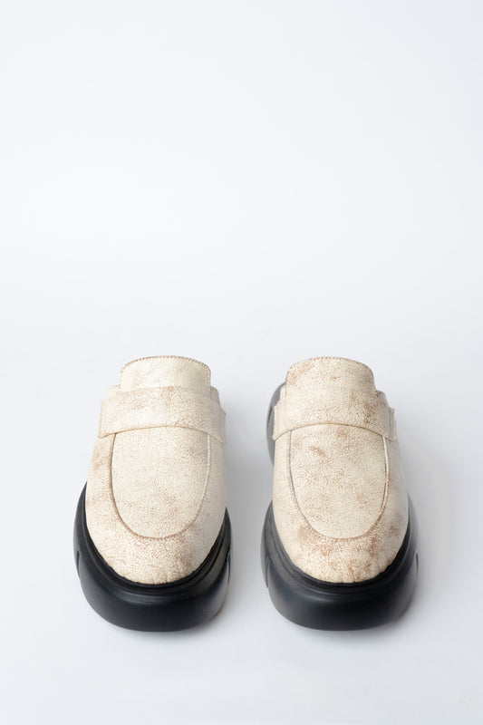 MULES WITH A ROUNDED TOE AND CHUNKY SOLE