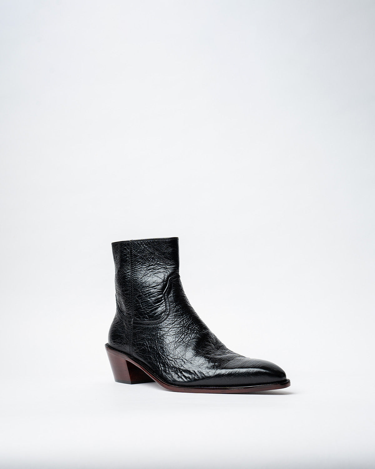 ANKLE BOOTS WITH A SQUARE POINTED TOE AND TRAPEZOID HEEL, FEATURING A SIDE ZIP CLOSURE