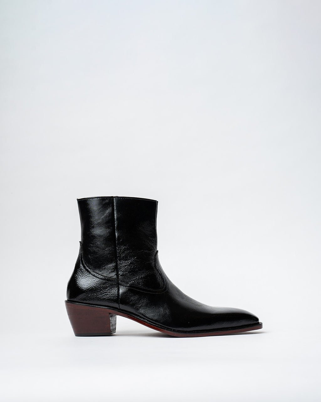 ANKLE BOOTS WITH A SQUARE POINTED TOE AND TRAPEZOID HEEL, FEATURING A SIDE ZIP CLOSURE