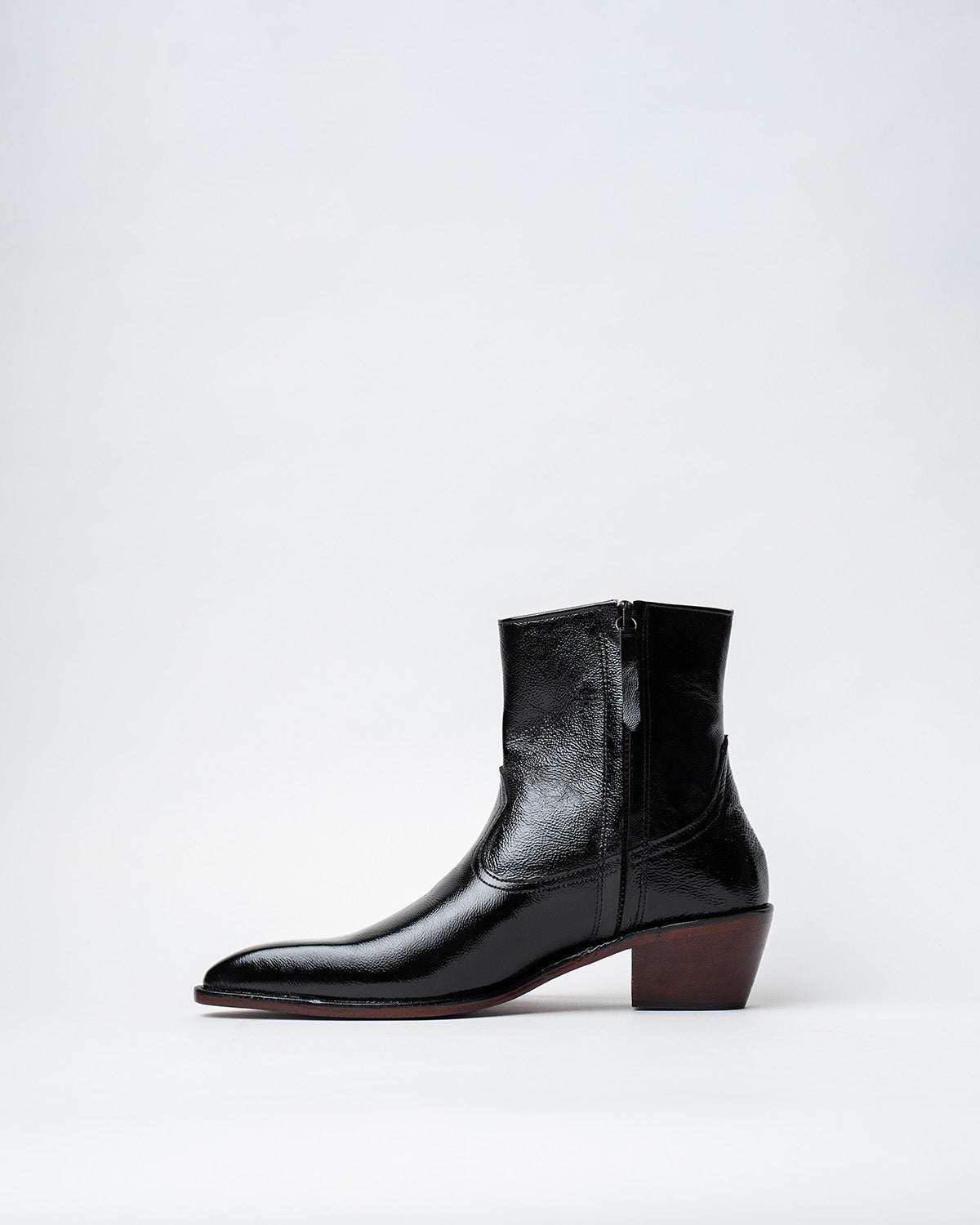 ANKLE BOOTS WITH A SQUARE POINTED TOE AND TRAPEZOID HEEL, FEATURING A SIDE ZIP CLOSURE