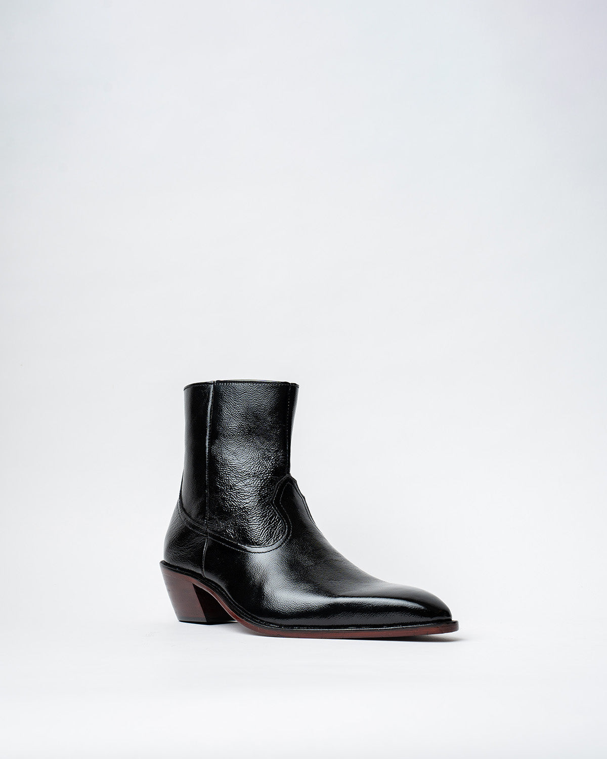 ANKLE BOOTS WITH A SQUARE POINTED TOE AND TRAPEZOID HEEL, FEATURING A SIDE ZIP CLOSURE