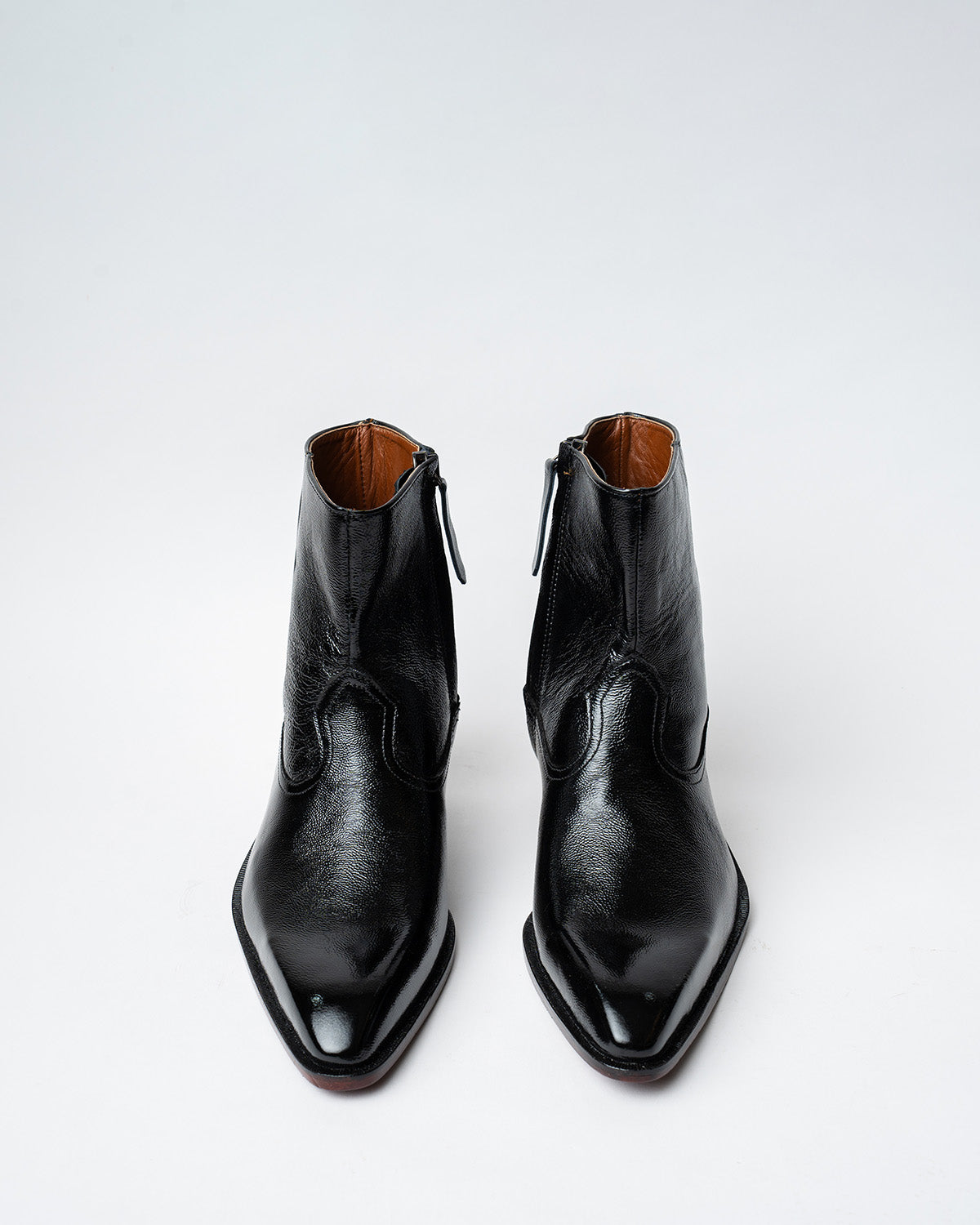 ANKLE BOOTS WITH A SQUARE POINTED TOE AND TRAPEZOID HEEL, FEATURING A ...