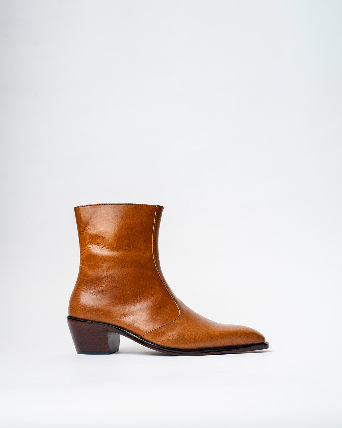 COWBOY ANKLE BOOTS WITH A SQUARE POINTED TOE AND TRAPEZOID HEEL, FEATU ...
