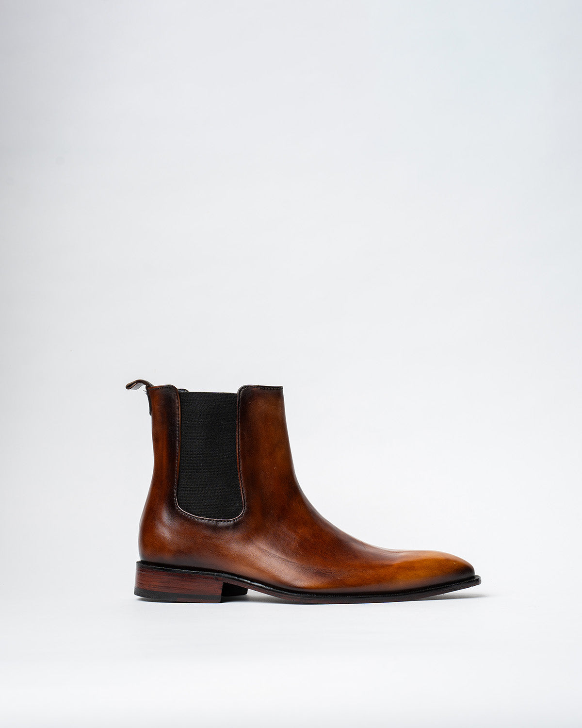 COWBOY ANKLE BOOTS WITH A SQUARE POINTED TOE AND TRAPEZOID HEEL, FEATURING A SIDE ZIP CLOSURE