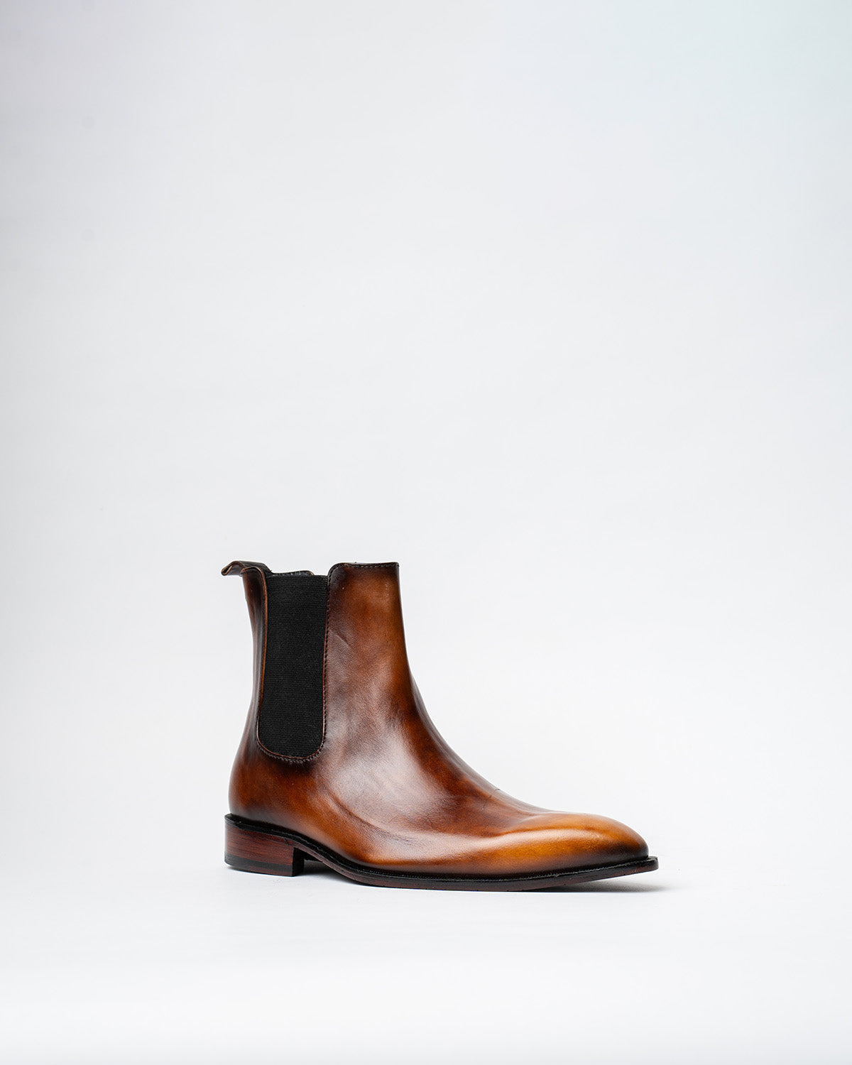 COWBOY ANKLE BOOTS WITH A SQUARE POINTED TOE AND TRAPEZOID HEEL, FEATURING A SIDE ZIP CLOSURE