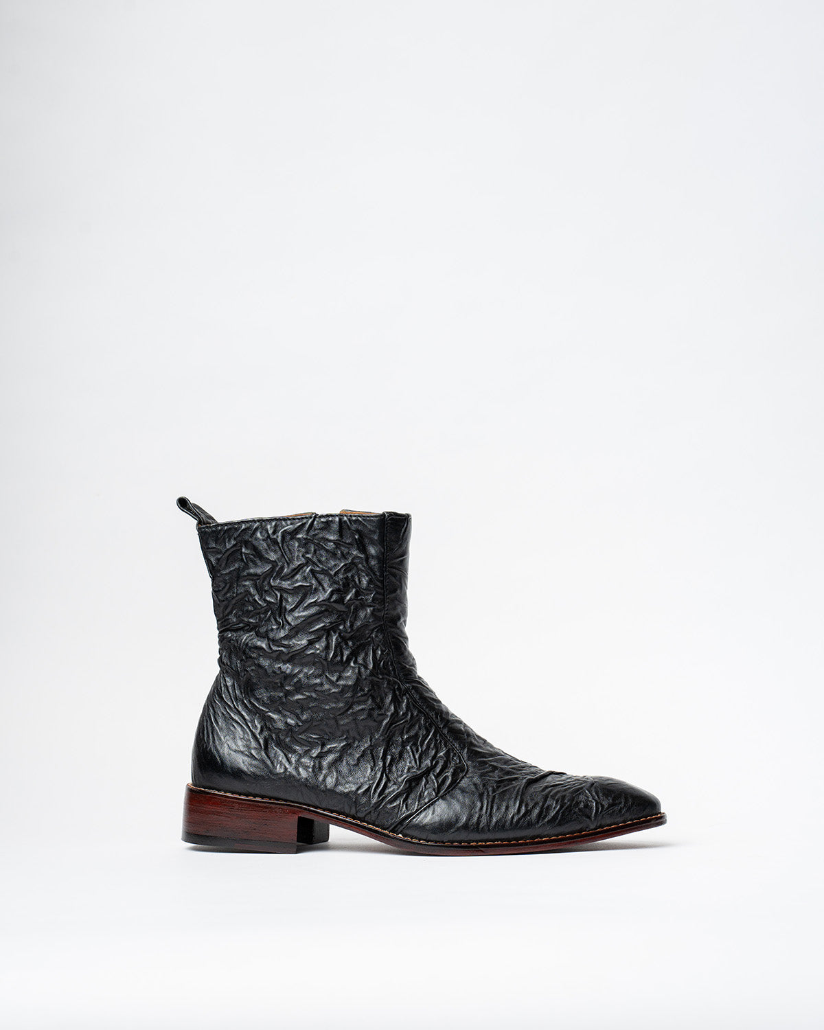 COWBOY ANKLE BOOTS WITH A SQUARE POINTED TOE AND TRAPEZOID HEEL, FEATURING A SIDE ZIP CLOSURE