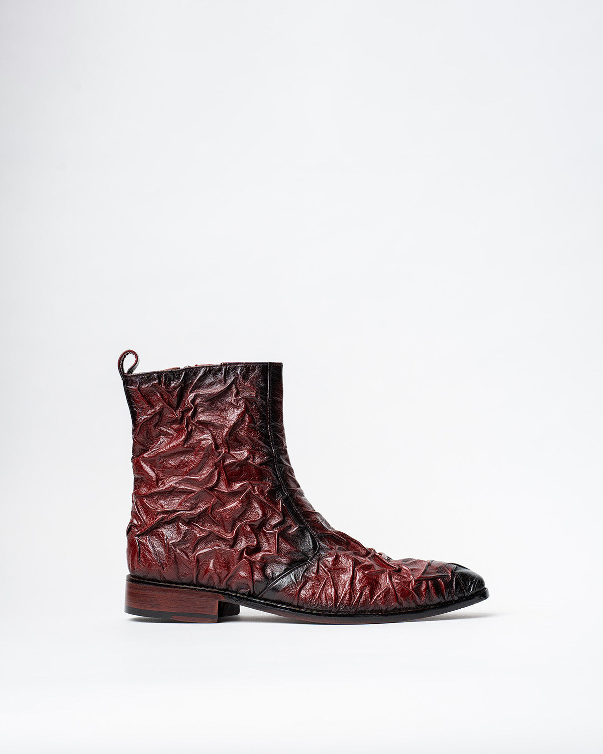 COWBOY ANKLE BOOTS WITH A SQUARE POINTED TOE AND TRAPEZOID HEEL, FEATURING A SIDE ZIP CLOSURE