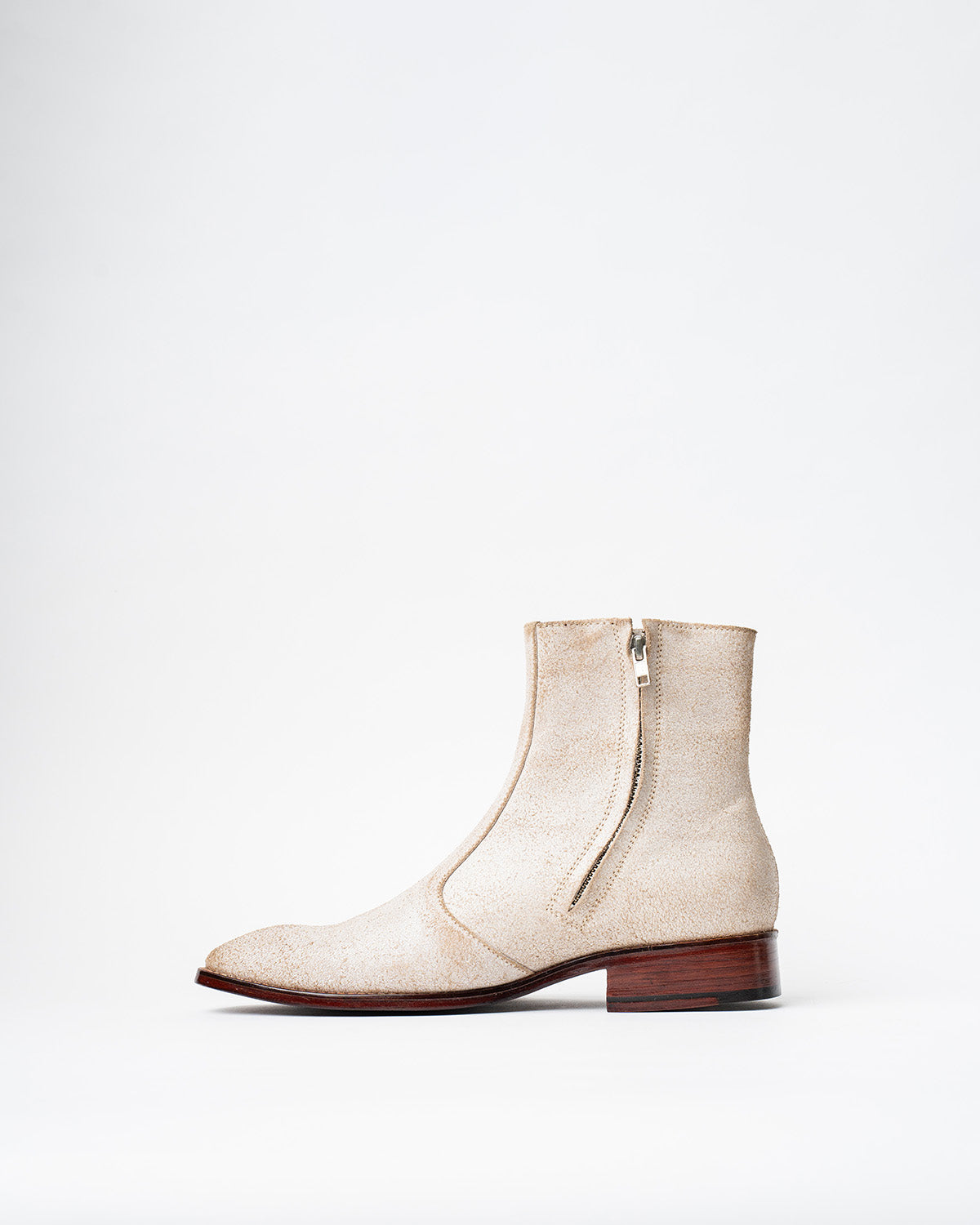 COWBOY ANKLE BOOTS WITH A SQUARE POINTED TOE AND TRAPEZOID HEEL, FEATURING A SIDE ZIP CLOSURE