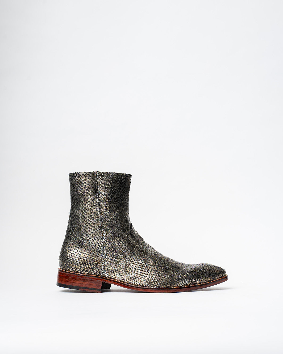 ANKLE BOOTS WITH A SQUARE POINTED TOE AND TRAPEZOID HEEL, FEATURING A SIDE ZIP CLOSURE