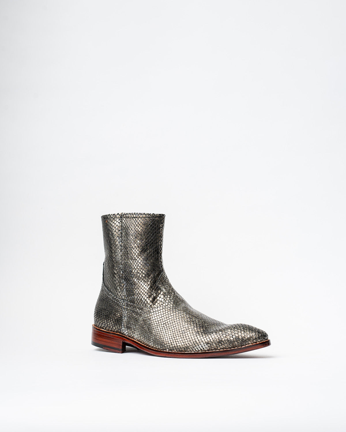 ANKLE BOOTS WITH A SQUARE POINTED TOE AND TRAPEZOID HEEL, FEATURING A SIDE ZIP CLOSURE