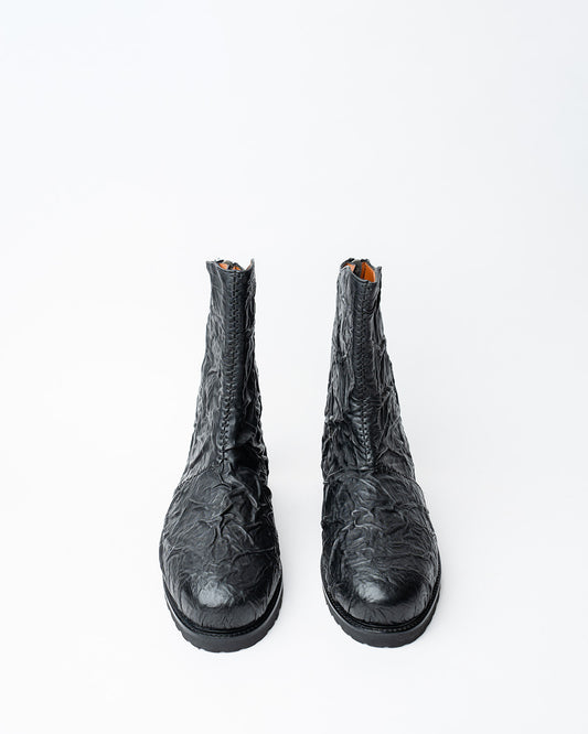 ANKLE BOOTS WITH A ROUNDED TOE, FEATURING A BACK ZIP CLOSURE.