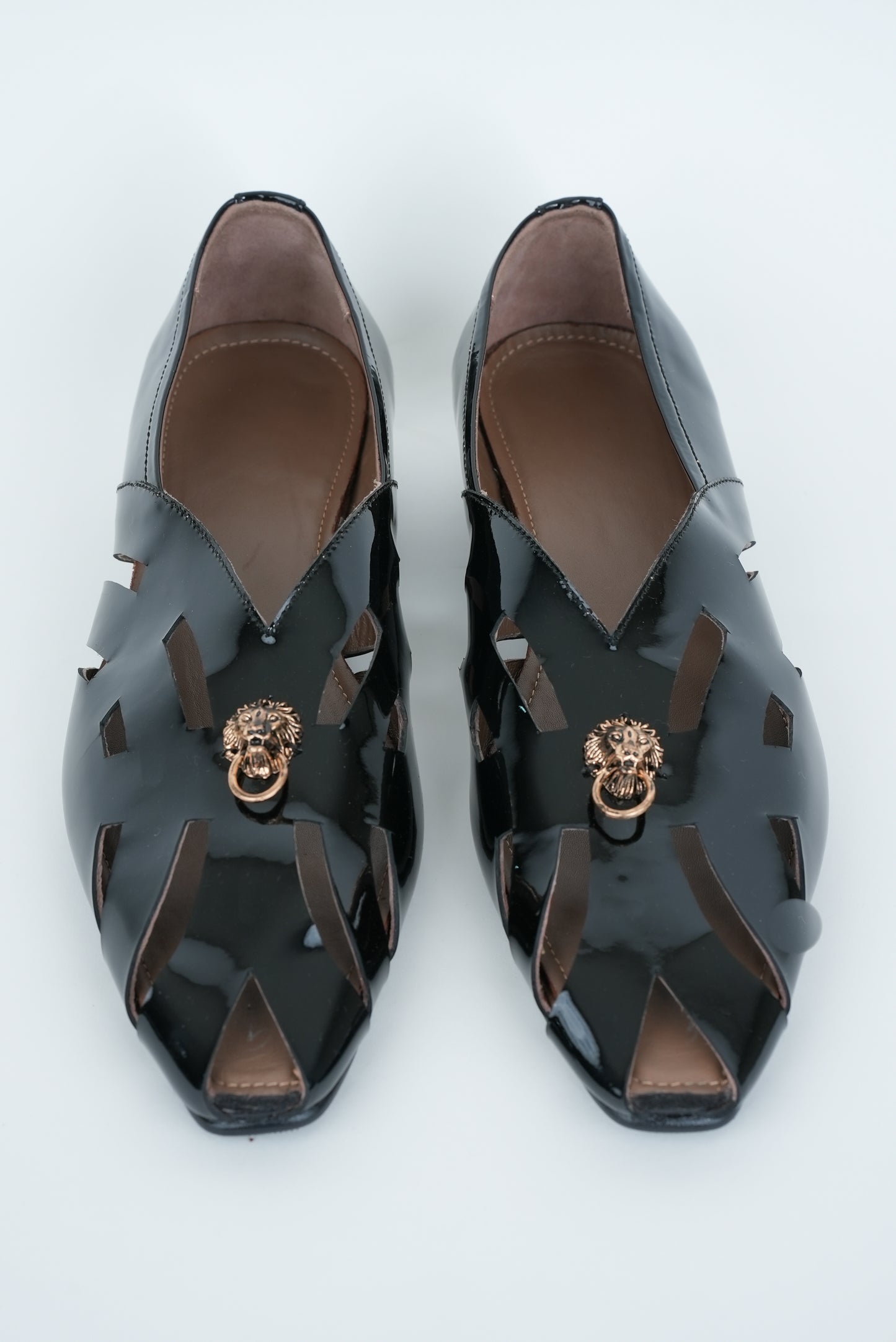 CLASSIC BLACK WITH GOLD  LION STUD AND SQUARE POINTED  TOE CUT JUTTI