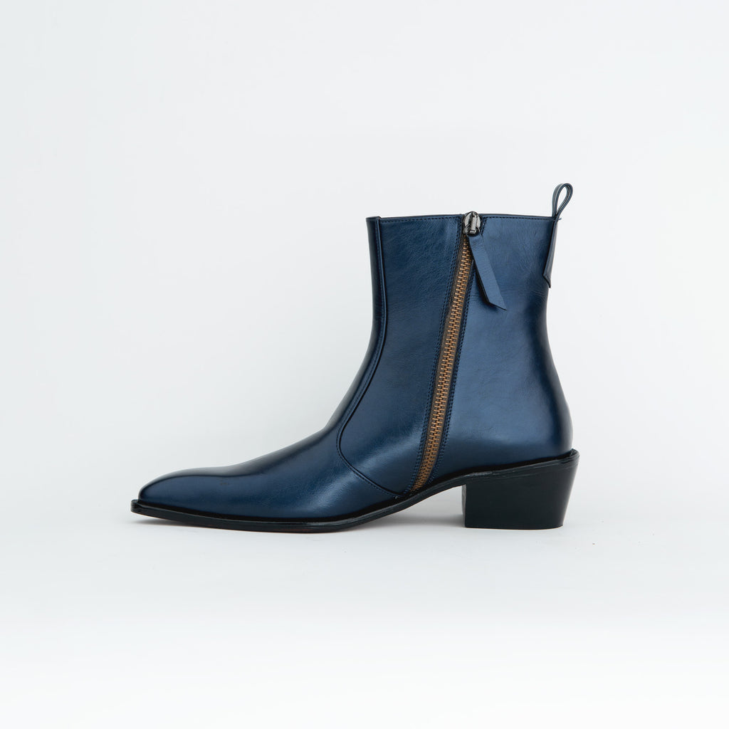 METALLIC BLUE BOOTS WITH A SQUARE POINTED TOE AND TRAPEZOID HEEL