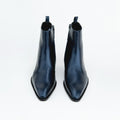 METALLIC BLUE BOOTS WITH A SQUARE POINTED TOE AND TRAPEZOID HEEL